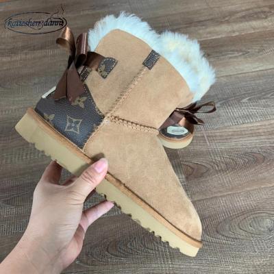 China 2021 Fashion Girl Snow Boots Ladies Winter Sheepskin Snow Boots Women Fur Hairy Fluffy Boots for sale