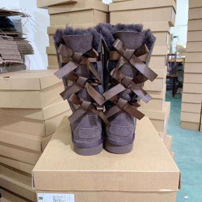 China Winter Thermal Snow Women Boots Sheepskin Fur Women Ladies Boots With Bow for sale