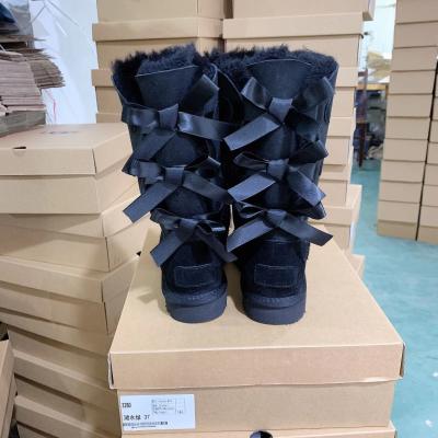 China Multi Color Thermal Women Warm Winter Soft Boots Sheepskin Fuzzy Snow Boots With Three Bows For Women for sale