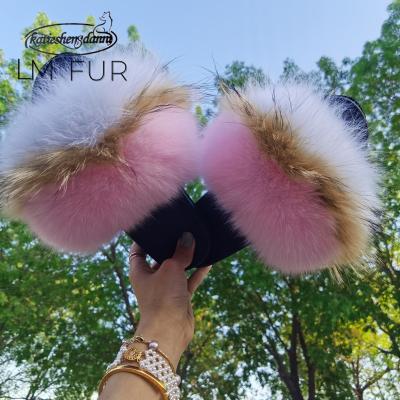 China Cheap Designer CUSHIONING Plush Big Platform Pom Pom Vendor Faux Raccoon Fur Purple Best Quality Slips Slippers for sale