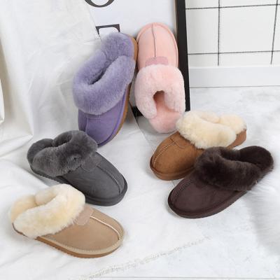 China 2021 Fashion Trend Women's Sheepskin Fur Winter Fluffy Indoor Slippers Custom Made Genuine Leather Suede Warm Slippers for sale