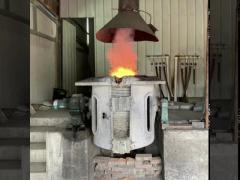 Iron melting furnace with compact aluminum shell