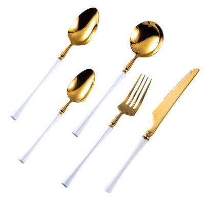 China Sustainable Gold Plated Dinnerware Set Royal Flatware Set Wedding Shiny Gold Plated Cutlery Set Handle White Flatware for sale