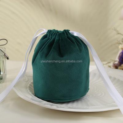 China Eco-friendly Wholesale Christmas Eve Candy Flannel Pocket Ribbon Velvet Bag Drawstring Gift Bags for sale