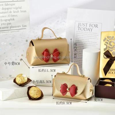 China Eco-Friendly Newcomer Diy Personalized Small Pink PU Leather Birthday Party Wedding Favors Gift Candy Box Bag Handbag With Silk Bowknot for sale