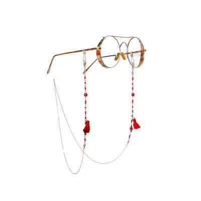 China Fashoin Copper Fashionable Chic Tassel Bohemian Beads Red Women Sunglasses Tie With Tassel For Glasses Face Masking Chain Cadena de gafas for sale