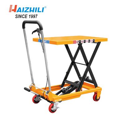 China Hotels Pedal Hydraulic Scissor Lift 350kg Lift Table With Roller for sale