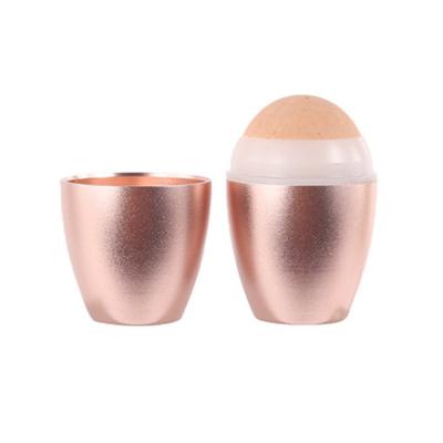 China Hot Sale Facial Oil Absorbing In Stock Rose Volcano Stone Facial Oil Absorbing Natural Volcanic Face Roller With Woman for sale