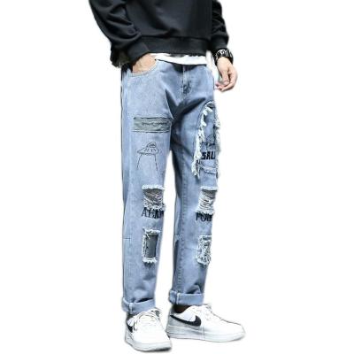 China Handsome Hong Kong Style Student Jeans Male Korean Version Ripped Straight Casual Pants Viable for sale