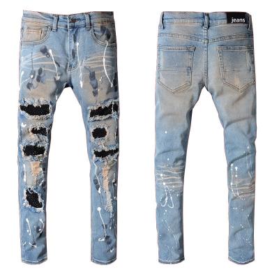 China 523 European and American youth elastic slim fit jeans vintage brand fashion foot patch small high street jeans for sale