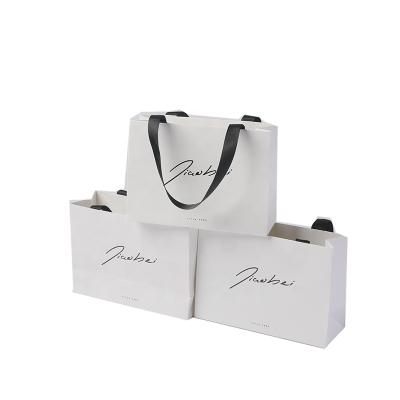 China Recyclable Custom Various Sizes And Various Colors Paper Bags T Shirt Paper Bags for sale