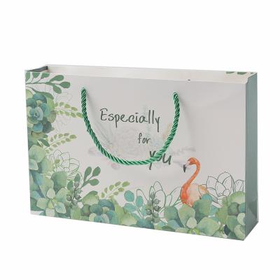 China Recyclable Customize Eco - Friendly Design Art Paper Fancy Shopping Paper Bag for sale