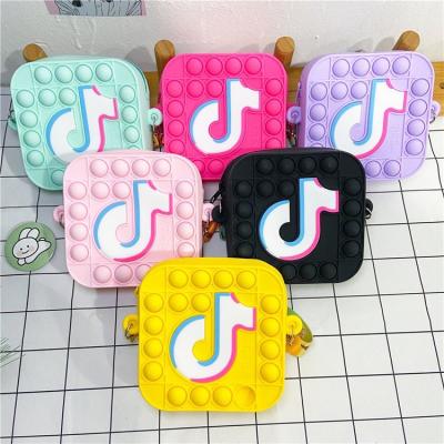 China Fashion Kids Silicone Push Bubble Doll Soft Cross - Body Hand Money Bag Wiggle Toy Push Pop It Coin Purse For Girls for sale