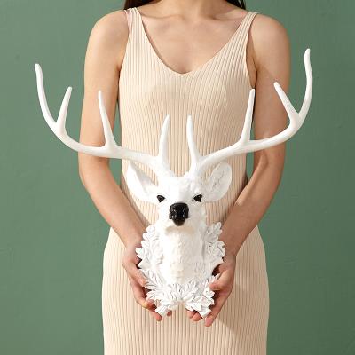 China Wholesale Minimalist Resin Wall Hooks Lace Up Animal Deer Head Wall Decor Head Hanging Home Decor Accessories for sale