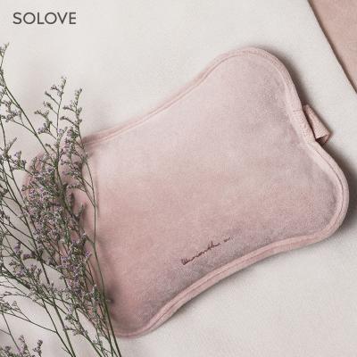 China R6 Safety And High Quality Custom Rechargeable Hot Water Bottle Electric Hot Water Bag Cute With Hand Pocket For Women Baby Use for sale