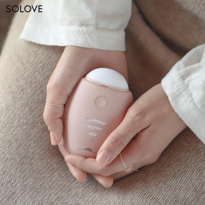 中国 SOLOVE Portable Mini 4000MAh Power Bank Hand Warmer 52 Degrees Good Hand Feeling Promotional Gift Birthday Creative Gift 販売のため