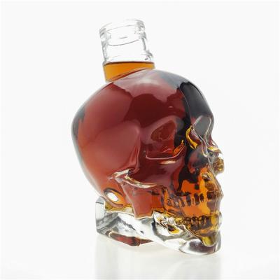 China Main Beverage 100ml 180ml 400ml 750ml Skull Shape Customize Unique Shape Liquor Glass Bottle for sale