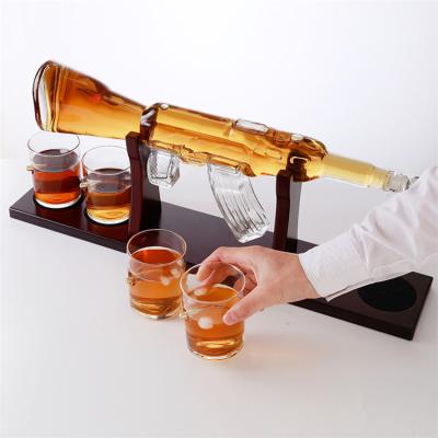 China Liquor Gun Shaped 750ml Clear Liquor Bottle For Packing Wine / Vodka / Whiskey / Spirits / Beverage With Stop for sale