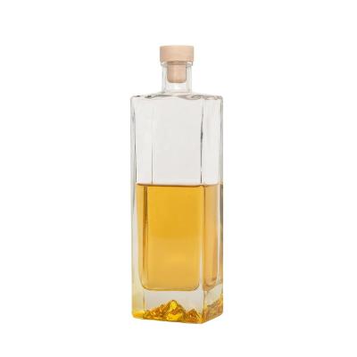 China Unique Design 500ml 750ml Beverage Mountain Bottom Empty Glass Bottle For Whiskey Liquor for sale