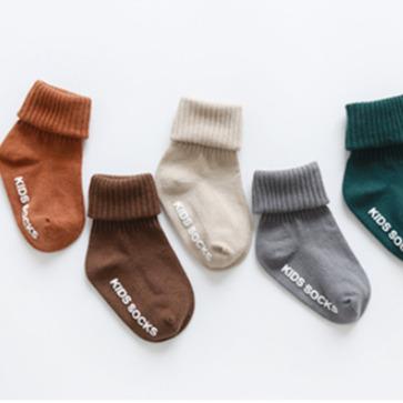 China Sporty children autumn and winter high tube boneless loose floor socks for sale