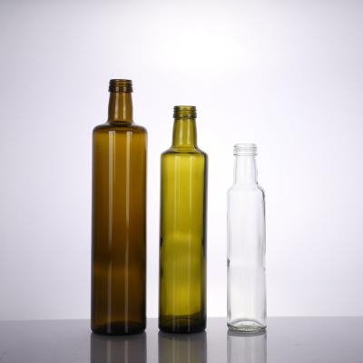 China Clear Transparent Flaxseed Oil Beverage Round Glass Olive Oil Bottle for sale