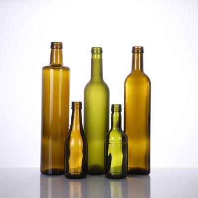 China Beverage Flaxseed Oil Glass Transparent Green Amber Round Bottle for sale