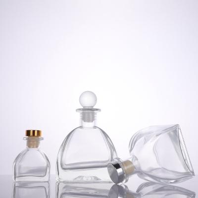 China 50ml 100ml 150ml 200ml Cosmetic Glass Square Diffuser Bottle Bottom Aromatherapy Bottle for sale