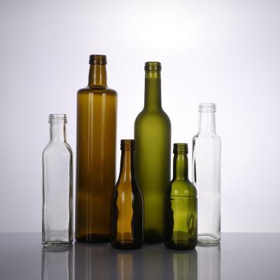 China Clear Amber Green Beverage 500ml 750ml Wine Bottles Empty Glass Wine Bottles for sale