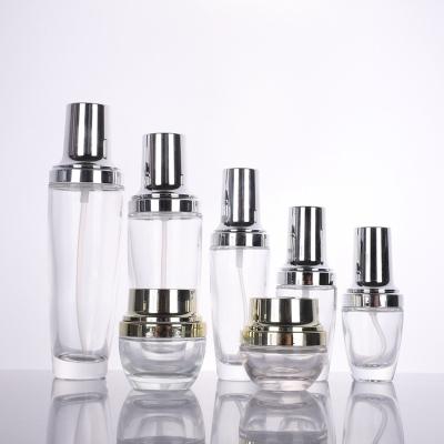 China High Quality Personal Care Silver Empty Private Label Skin Care Glass Cosmetic Bottle for sale