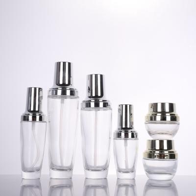 China Luxury Wholesale Personal Care Glass Bottle 10ml 50ml 100ml Glass Bottle Cosmetic Packaging for sale