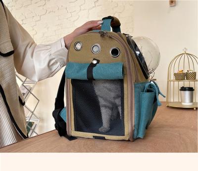 China Breathe Cat Come Out Space Capsule Pet Cat Dog Bag Cat Backpack Supplies Convenient Breathable Canvask for sale