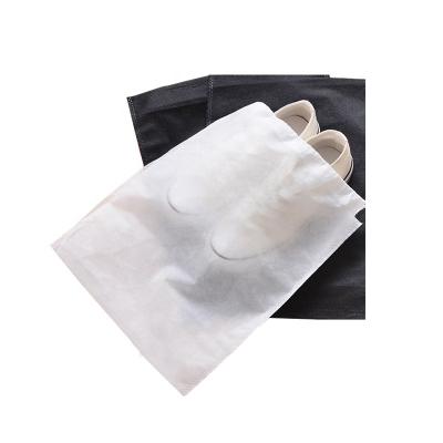 China Disposable Stain Cloth Storage Bag Pull Rope Package Pouch Boot Bag Travel Nonwoven Shoes Dust Dust Shoe Bag for sale