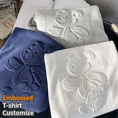 China anti-wrinkle 100% sustainable cotton premium emboss tee shirts custom screen print embossed t shirts embroidery emboss logo mens t shirt for sale