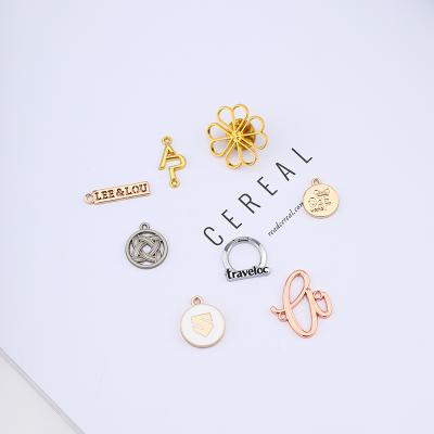 China High Quality Custom Metal Washable Logo Label Engraving Brand Metal Name Plate Sew Brands Tag For Clothes for sale