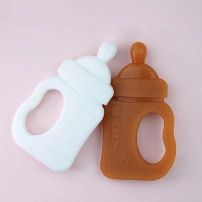 China Baby Toy Cartoon Milk Bottle Shape Teether Soft Silicone Chewing Teething Toy Nipple Care Accessories for sale