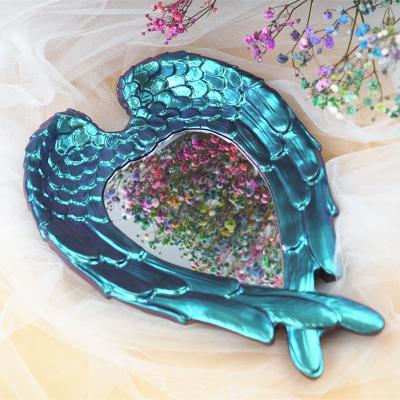 China Viable Handcraft Wings Heart Resin Rolling Feather Shape Jewelry Tray Silicone Mold for sale