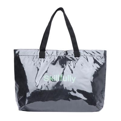 China Large capacity PORTABLE female Korean simple transparent waterproof PVC students shoulder bag logo bag tide single handbag for sale