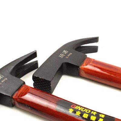 China Nail hammer handmade tools - iron hammer with wooden handle for sale