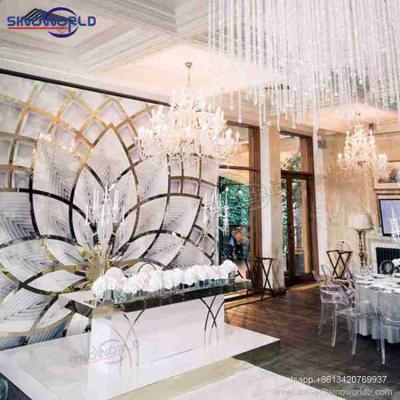 China Fashionable Wedding Decorations China Golden Acrylic Laces Decoration Wedding Lotus Flower Stage Backdrop Wooden Base for sale