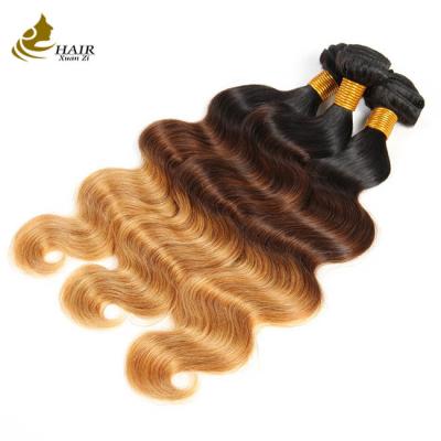 China Precio de fábrica Color Ombre 1b/4/27 Cabello virgen brasileño Body Wave Bundles con cierre en venta