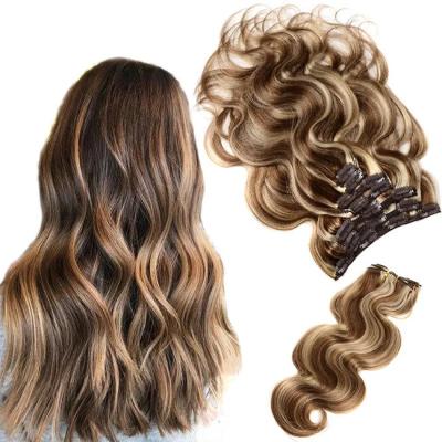 China Malasia tejido sin costura clip en extensiones de cabello suave y suave en venta