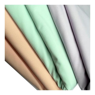 China Stretch 85% Nylon Spandex Summer T-shirt Stretch Colored Ice Silk Knitting Fabric for sale