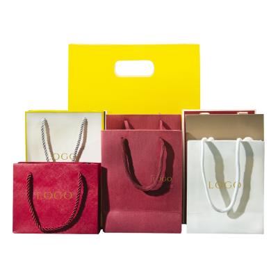 China Wholesale Customized Recyclable Printed Luxury Jewelry Gift Shopping Paper Bags With Handle for sale