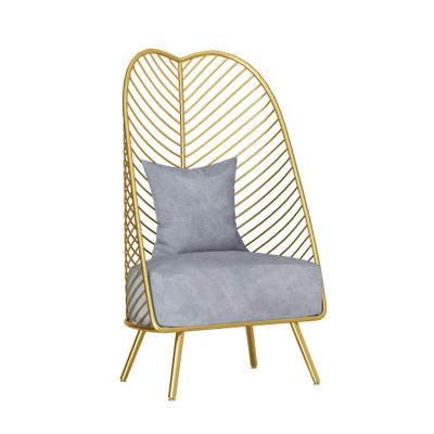 China Modern Lightweight Luxury Simple Living Room Chair Wrought Iron Plantain Golden Hollow Chair Suitable For Bedroom Cafe Hotel Lounge Chair for sale