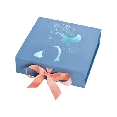 China Recyclable Custom Luxury Pale Blue Magnet Flap Clothing Paper Box Folding Magnetic Closure Gift Boxes With Changeable Ribbon for sale