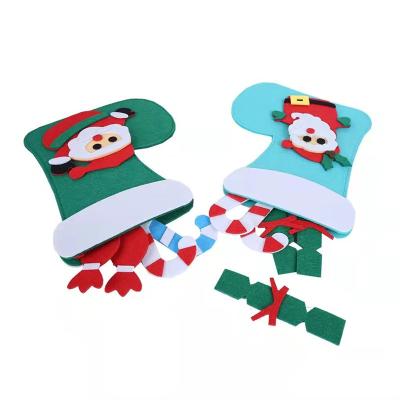 China Eco-friendly Christmas Mini Red Stockings Felt Fabric Christmas Stockings Gift Card Tree Holder Small Socks Decoration for sale