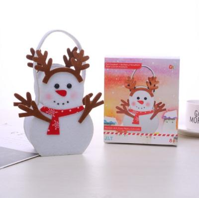 China Eco-friendly wedding small packaging Merry Christmas Santa Claus Snowman holiday candy dessert biscuit deer custom felt gift bags with logo for sale