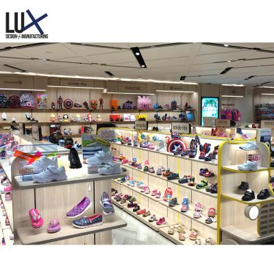 China Eco - Friendly Shoe Shop Interior Design Display Stand Furniture For Shoe Shops for sale