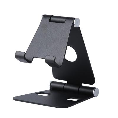 China Universal Waterproof Aluminum Desktop Adjustable Desktop Cell Phone Holder Mobile Stand with Anti-skid Base and Convenient Charging Port for sale