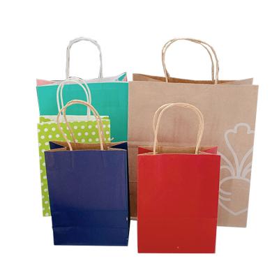 China Recyclable Kraft Paper Bag Shopping Paper Bags Recyclable Logo Printed With Twisted Handle Reusable for sale